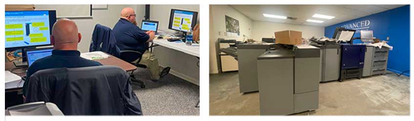 2 men sitting in front of computers doing online training courses