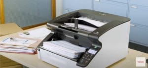 production document scanner with large stacks of documents in the feed